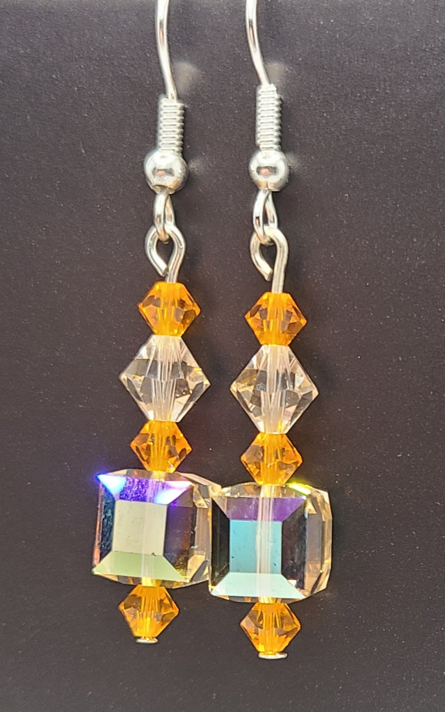 Earrings - Silk reflective and sunny orange Swarovski crystals with silver